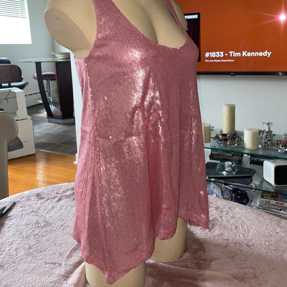 Shiny babydoll shirt. Stunning with a pair of heels and jeans. - Picture 2 of 15